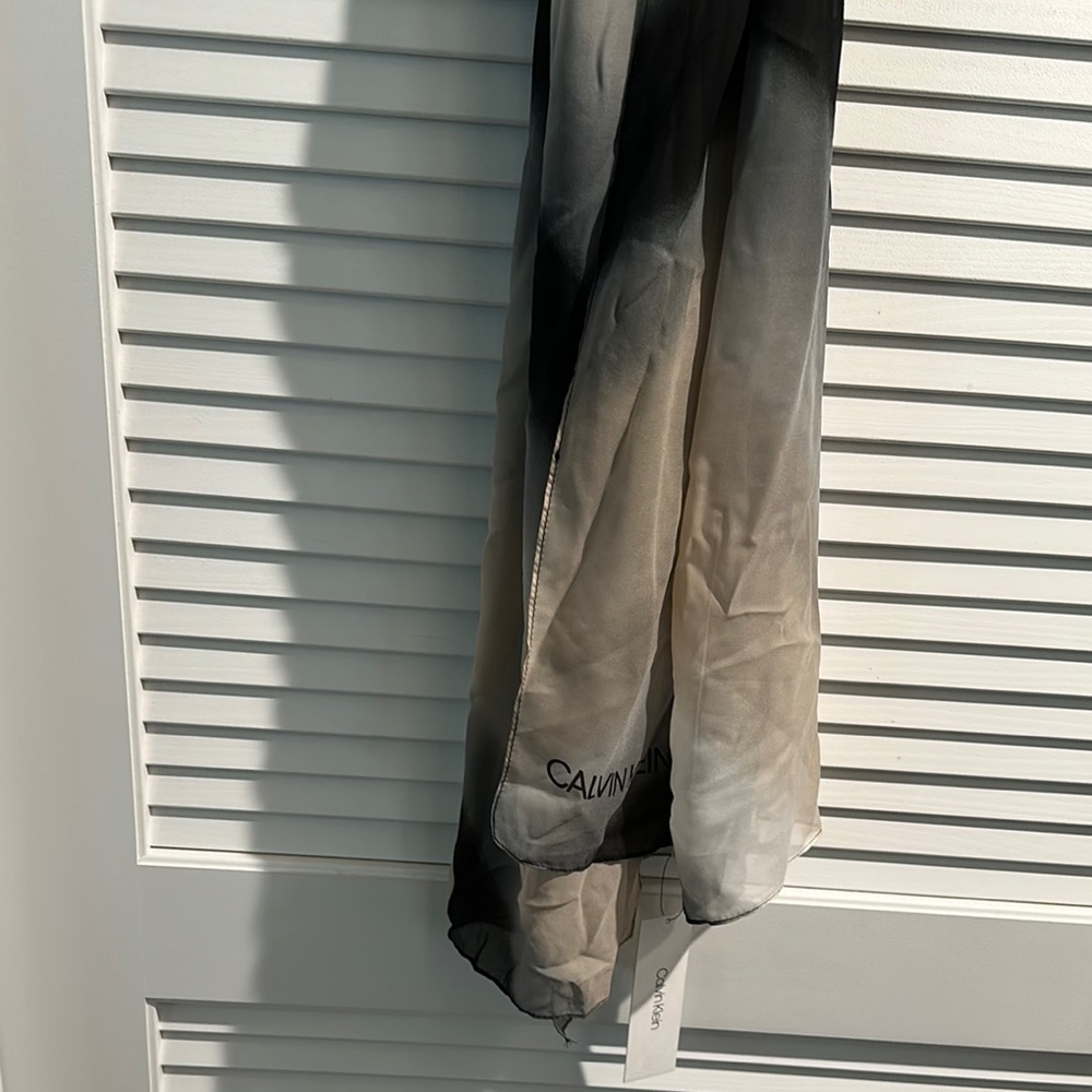 NWT Calvin Klein Long Scarf in black, gray, and beige colors. Size 6’x 2’
